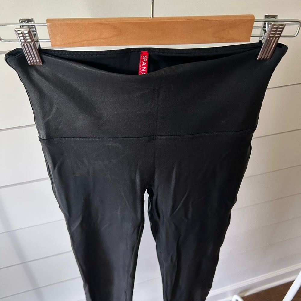 SPANX faux leather black leggings.